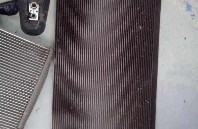 Aircon condenser, evaporator and expansion valve removed from a car