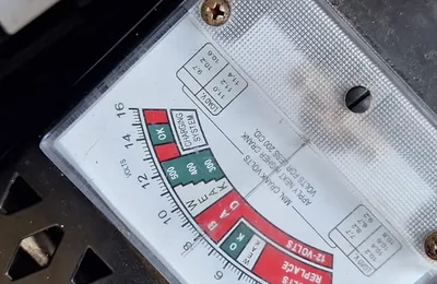 Battery load tester connected to a car battery