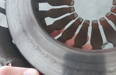 Clutch pressure plate fingers inspected during a clutch repair