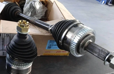 New GSP CV joint kit and a driveshaft ready to be fitted at Fangio Auto