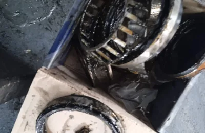 Worn wheel bearing exposed in a hub at Fangio Auto