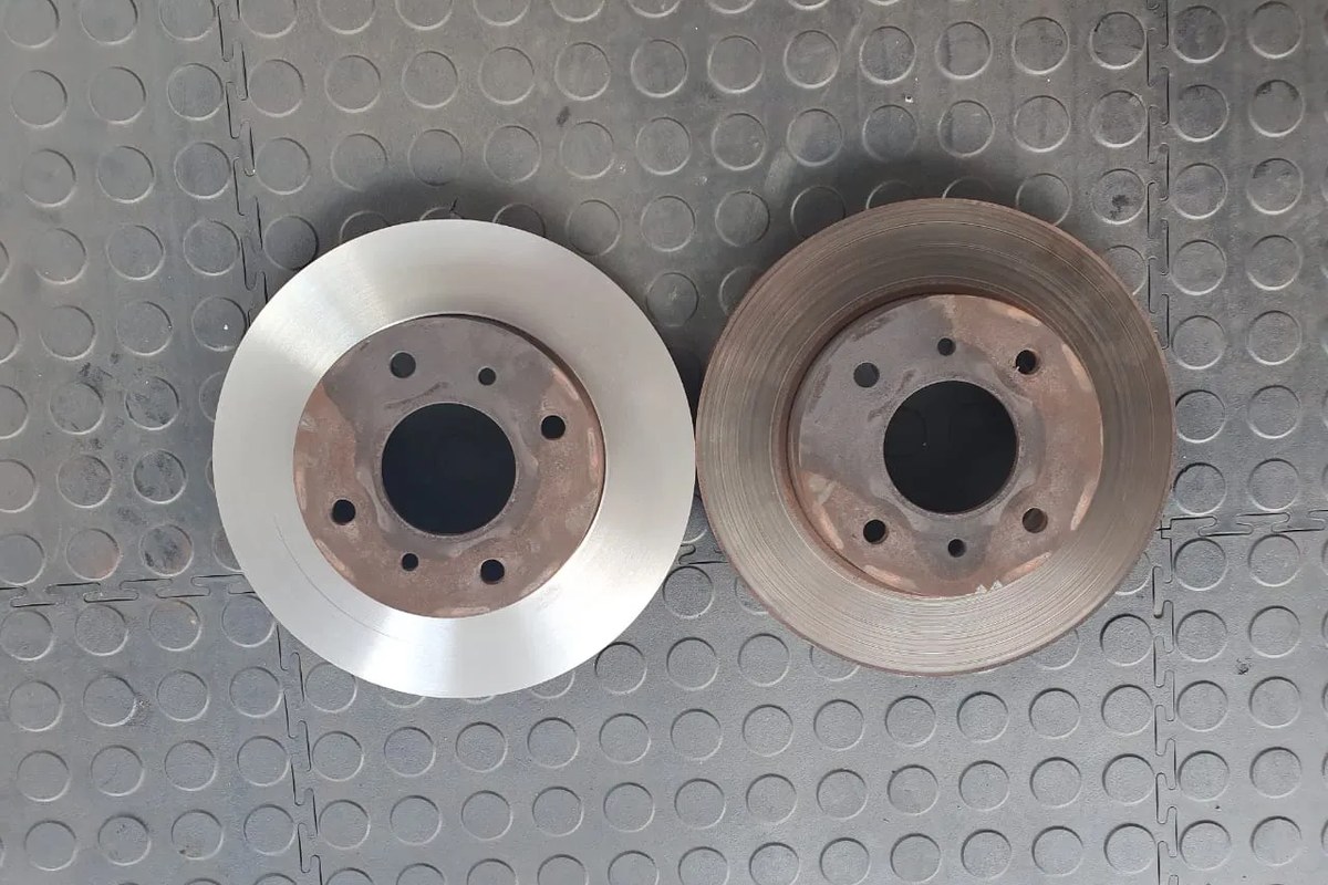 mechanic checking can you skim brake discs at Fangio Auto Service