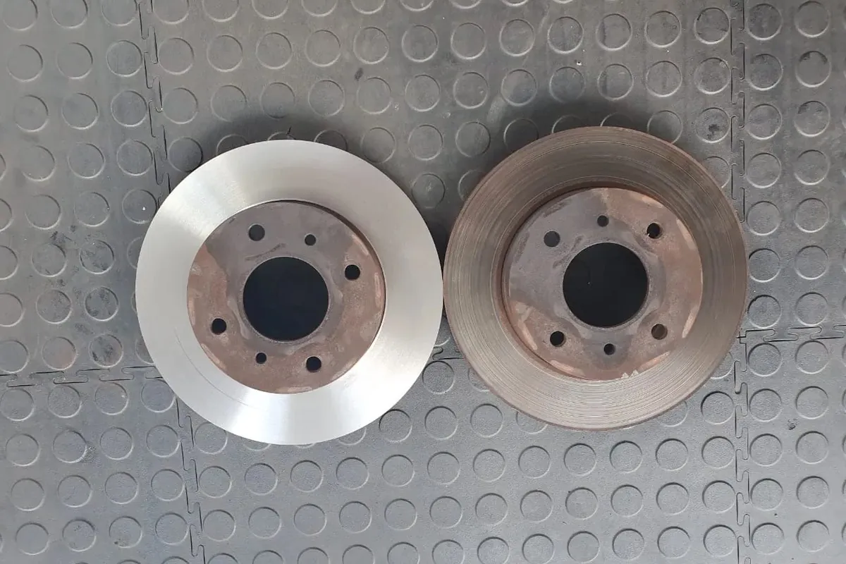 mechanic checking can you skim brake discs at Fangio Auto Service