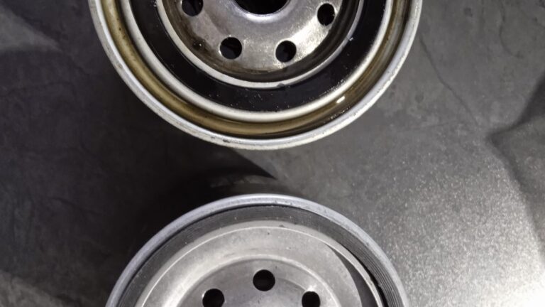 Used and new spin-on oil filters compared from above