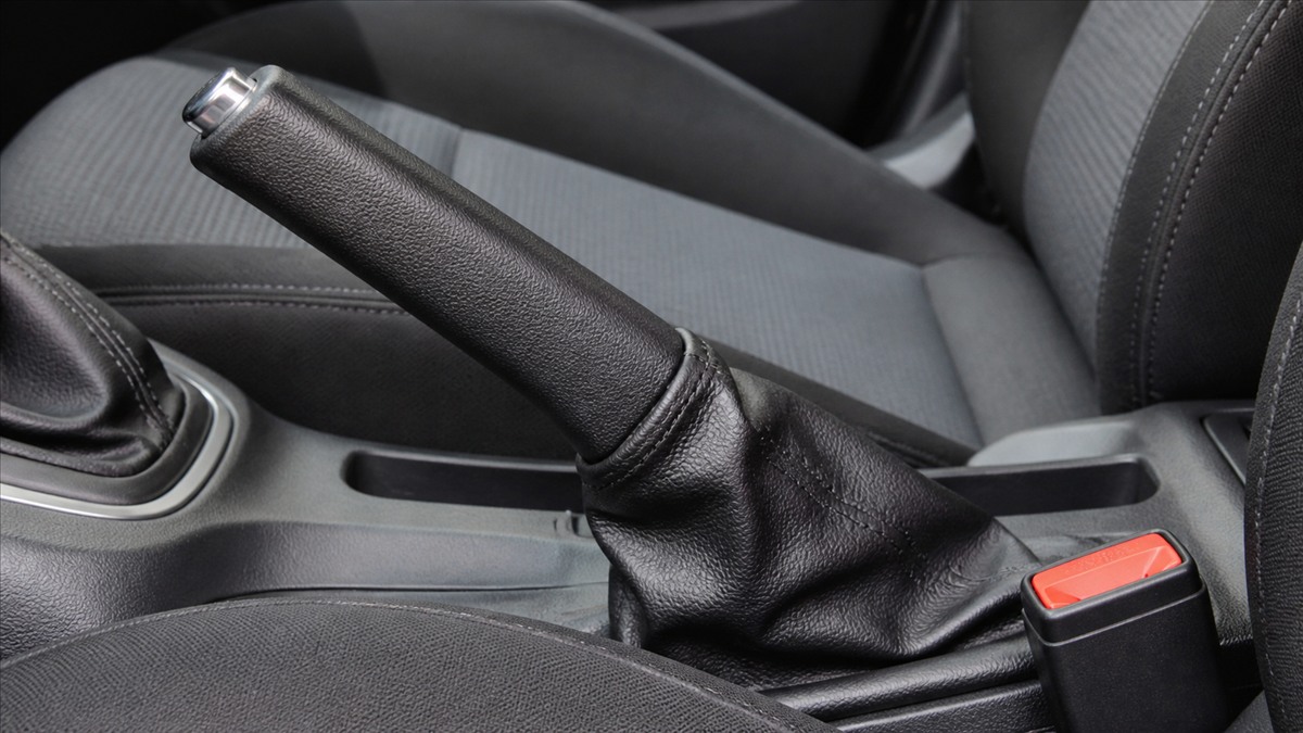 Mechanical handbrake lever raised inside a car