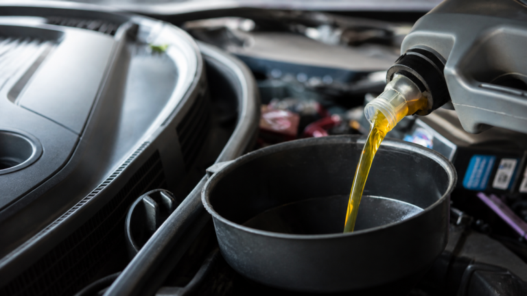Engine oil being poured during a major car service